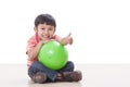 boy playing green ball Royalty Free Stock Photo