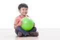 Boy playing green ball Royalty Free Stock Photo