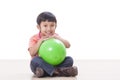 Boy playing green ball Royalty Free Stock Photo