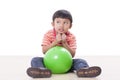 boy playing green ball Royalty Free Stock Photo