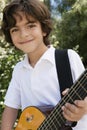 Boy Playing Guitar Royalty Free Stock Photo