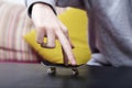 Boy is playing with his finger skateboard. Close up shot. Royalty Free Stock Photo