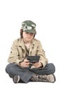 Boy playing with his gadget Royalty Free Stock Photo