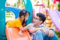 Boy playing with his sister at playground Royalty Free Stock Photo