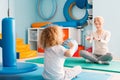 Boy playing with his therapist Royalty Free Stock Photo