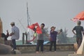 boy playing kite on Ancol beach, Jakarta. Sunday 16 July 2023