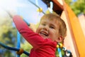 Boy playing on monkey bars Royalty Free Stock Photo