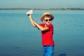 Boy playing outdoors with paper airplanes Royalty Free Stock Photo