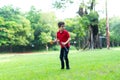 Boy Playing in the Park with Bubble Wand Royalty Free Stock Photo