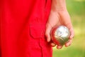 Boy playing petanque