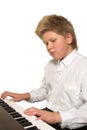 Boy playing piano Royalty Free Stock Photo