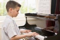 Boy Playing Piano Royalty Free Stock Photo