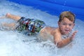 Boy playing in pool Royalty Free Stock Photo