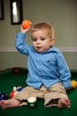 Boy playing on pool table Royalty Free Stock Photo