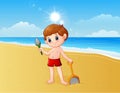 Boy playing a sand with shovel Royalty Free Stock Photo