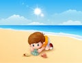 Boy playing a sea shells at the beach