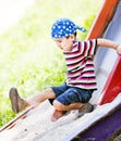 Boy playing on slide