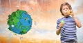 Boy playing with soap bubbles by low poly earth Royalty Free Stock Photo