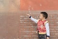 Boy playing soapbubbles