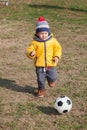 Boy playing with soccer or football ball. sports for exercise and activity. Royalty Free Stock Photo