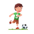 Boy playing soccer game. Kid in football uniform