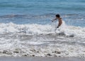 Boy playing surf Royalty Free Stock Photo