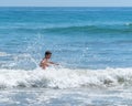 Boy playing surf Royalty Free Stock Photo