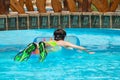 Boy playing in swimming pool Royalty Free Stock Photo