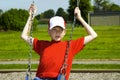 Boy Playing on Swing Royalty Free Stock Photo