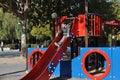 Boy playing on the swings