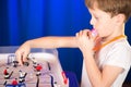 Boy playing table hockey Royalty Free Stock Photo