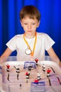 Boy playing table hockey Royalty Free Stock Photo