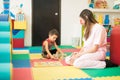 Boy playing in a therapy center