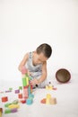 Boy playing toy bricks