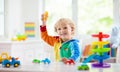 Boy playing toy cars. Kid with toys. Child and car Royalty Free Stock Photo