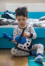 Boy playing with toy helicopter Royalty Free Stock Photo