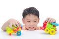 Boy playing toys over white Royalty Free Stock Photo