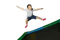 Boy playing on a trampoline Royalty Free Stock Photo