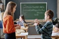 Boy Playing Trumpet At Music Lesson Royalty Free Stock Photo