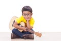 Boy playing ukulele Royalty Free Stock Photo