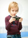 A boy playing a video game on his game console Royalty Free Stock Photo