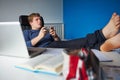 Boy Playing Video Game Instead Of Studying Royalty Free Stock Photo