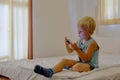 Boy playing video games on portable device Royalty Free Stock Photo