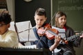 Boy Playing Violin In School Orchestra Royalty Free Stock Photo