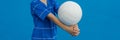 Boy playing volleyball  in blue Royalty Free Stock Photo