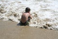 Boy Playing in Water