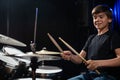 A boy plays drums in a recording studio Royalty Free Stock Photo