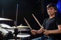 A boy plays drums in a recording studio Royalty Free Stock Photo