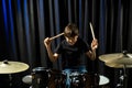 A boy plays drums in a recording studio Royalty Free Stock Photo