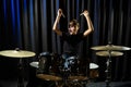 A boy plays drums in a recording studio Royalty Free Stock Photo